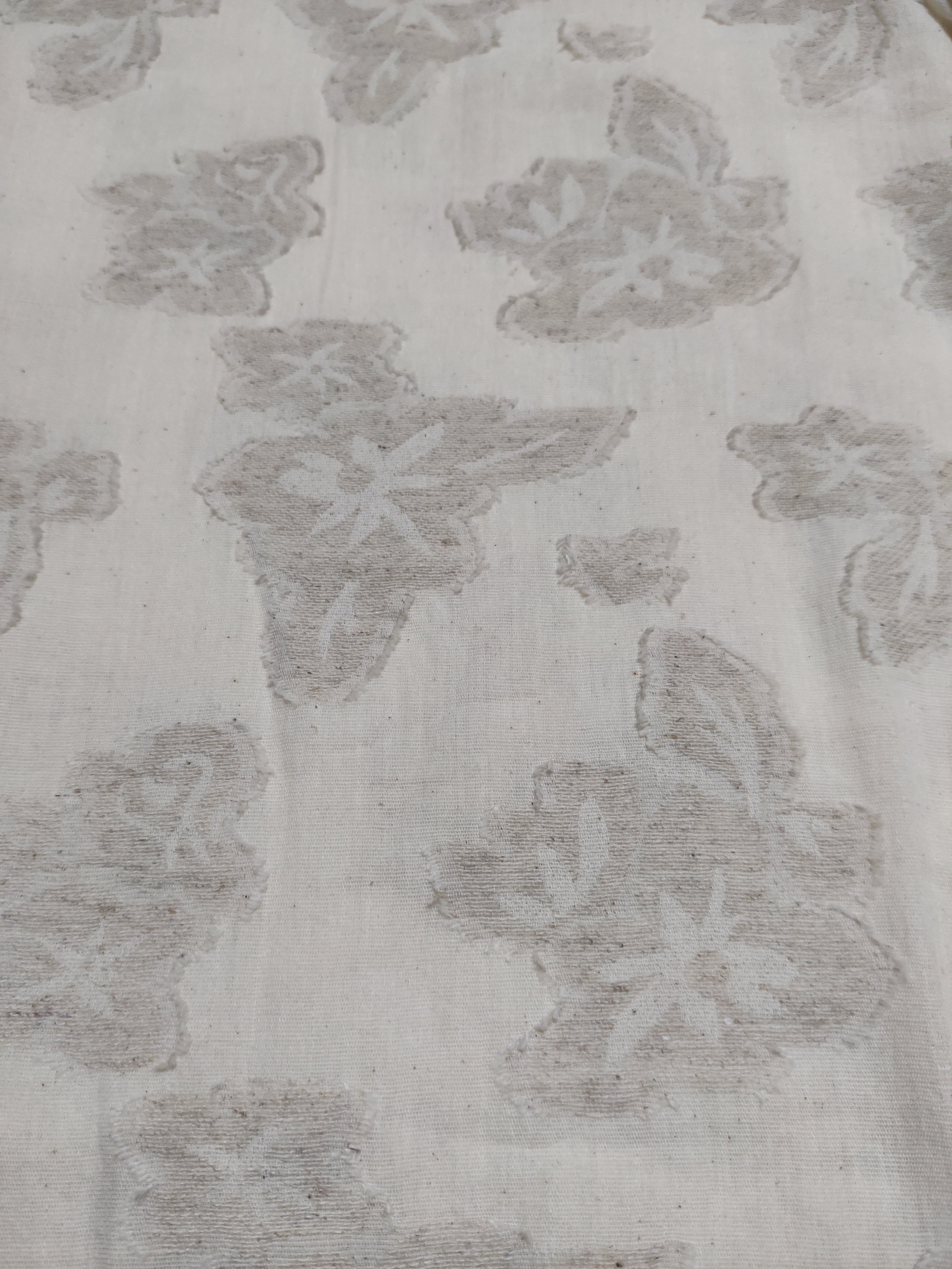 Embossed Flowers in Beige Linen Shirt in Closeup