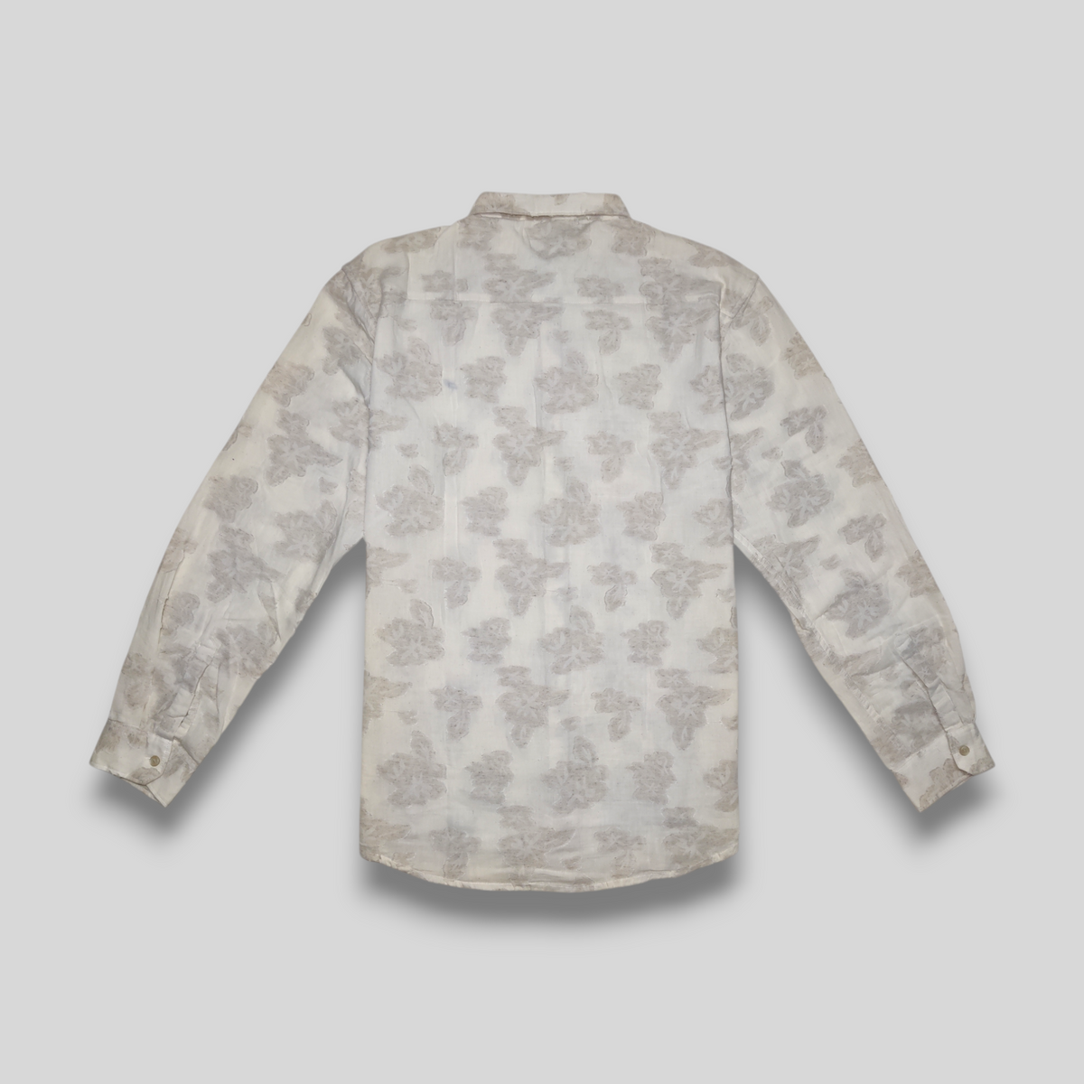 Floral patterned shirt on a light gray background