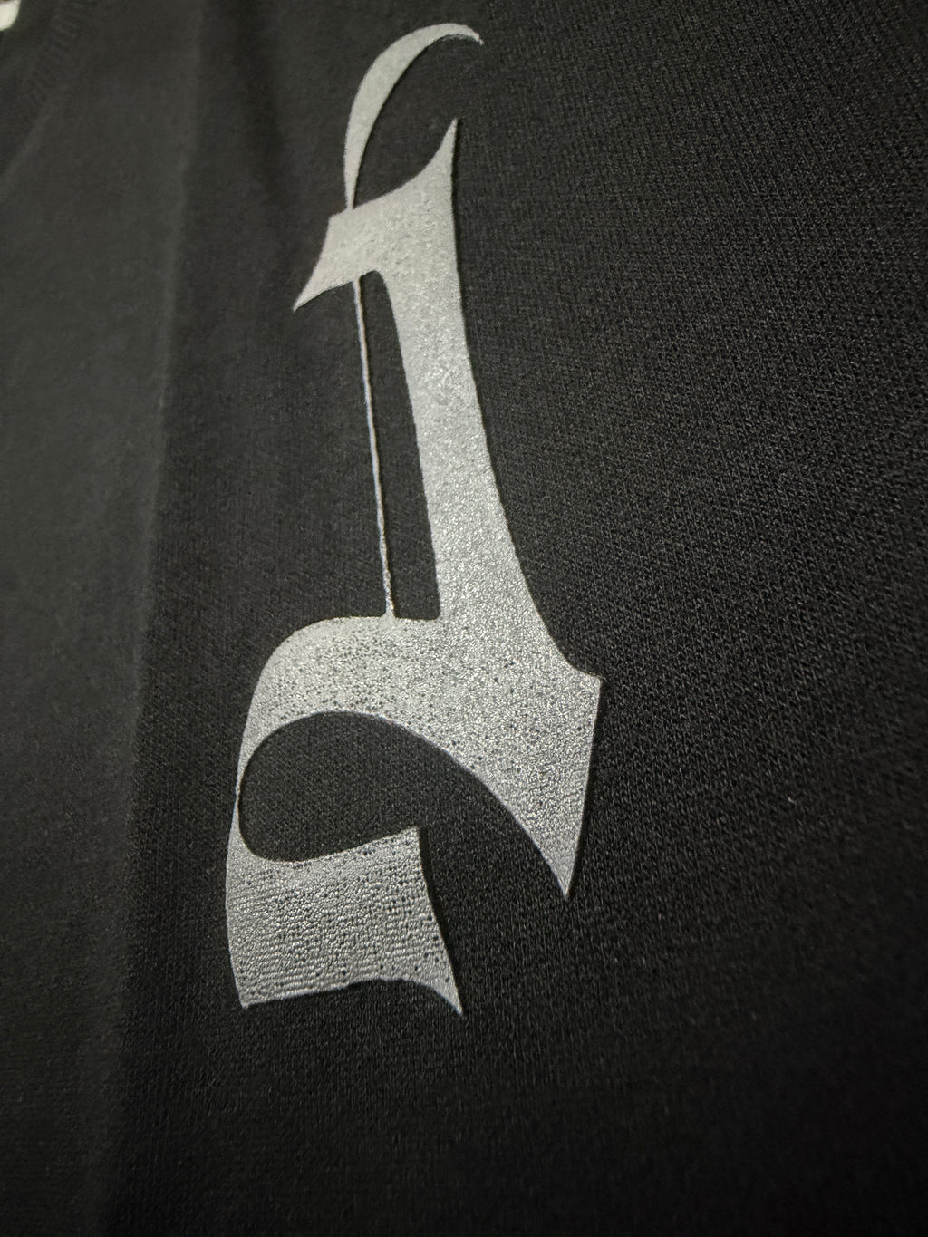 HD Grey logo on a black tshirt