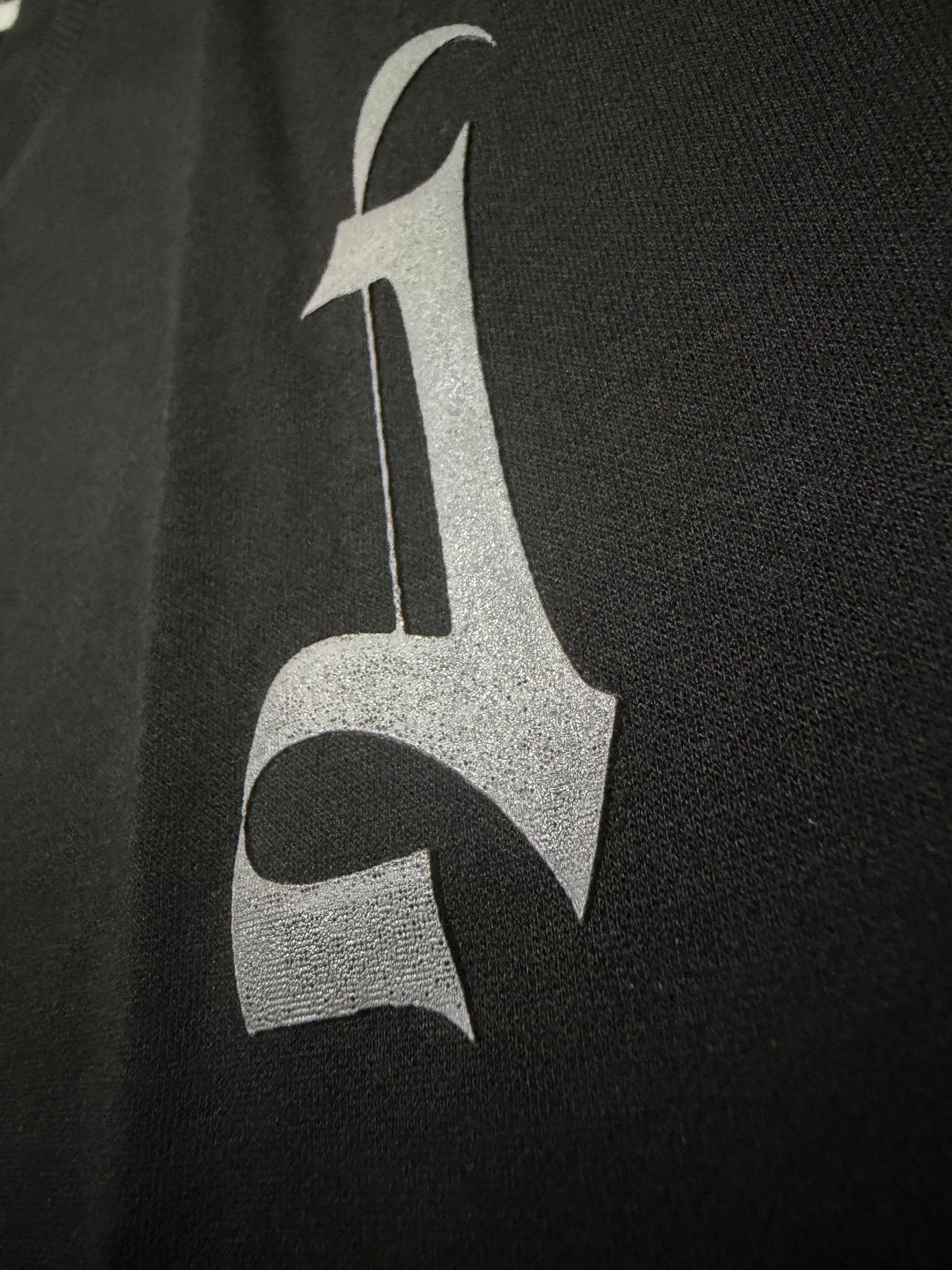 HD Grey logo on a black tshirt