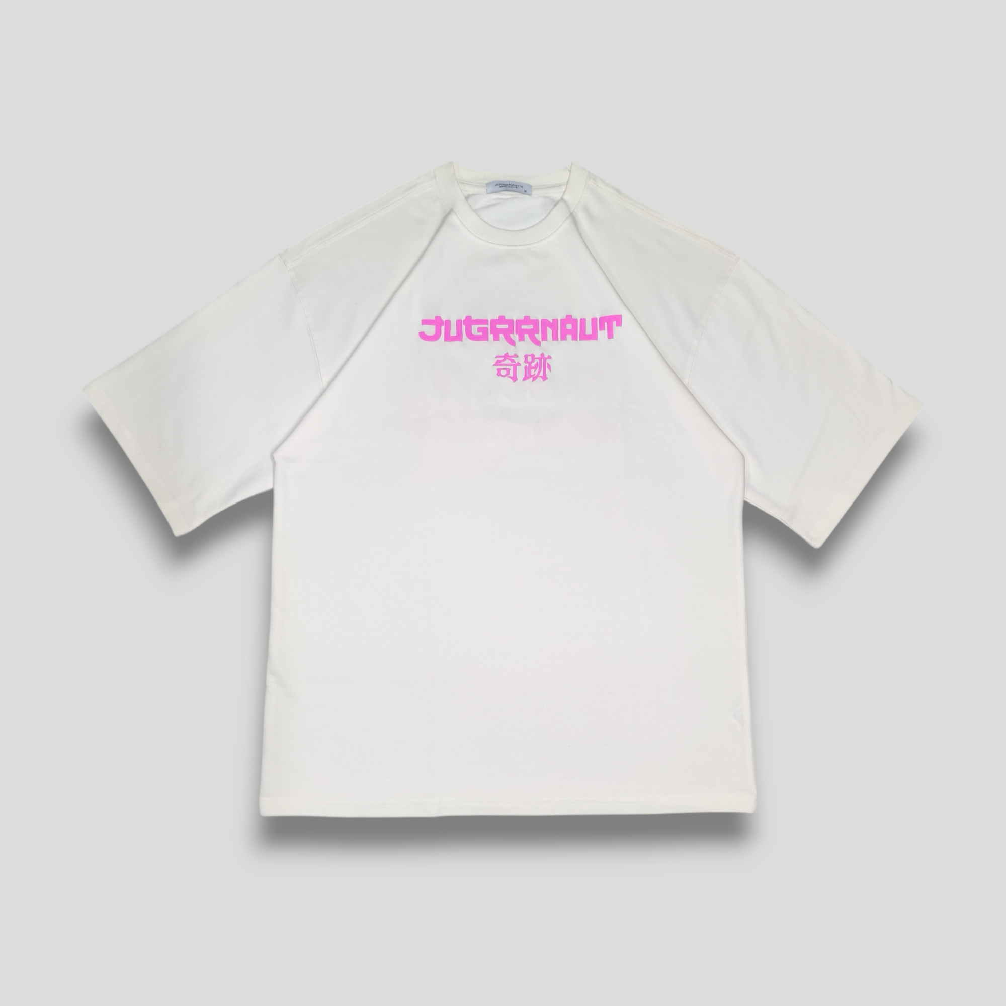 White crew neck t-shirt with 'JUGRRNAUT's MIRACLE' text in pink and a fluorescent cherry blossom artwork on the back.
