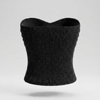 Black strapless top on a light gray background