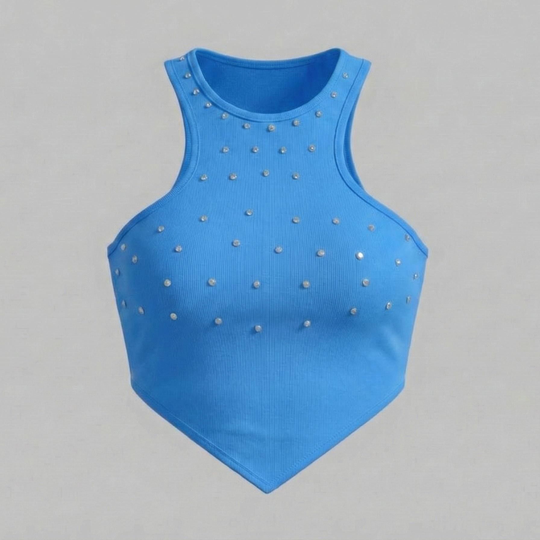 Blue tank top with silver studs on a gray background