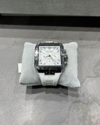 Watch on a gray cushion with a gray background