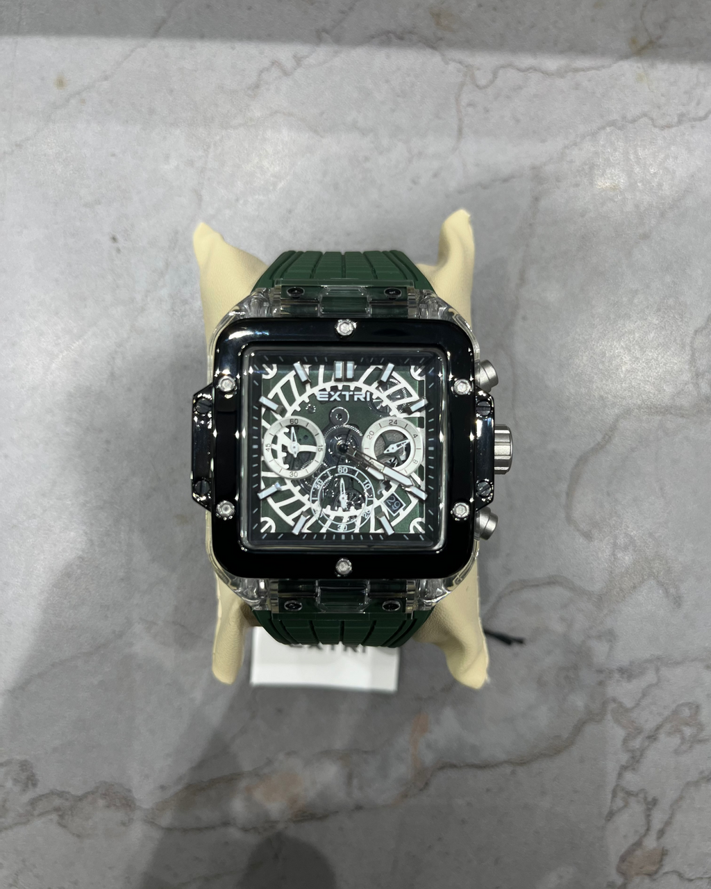 Luxury watch with a unique design on a marble surface