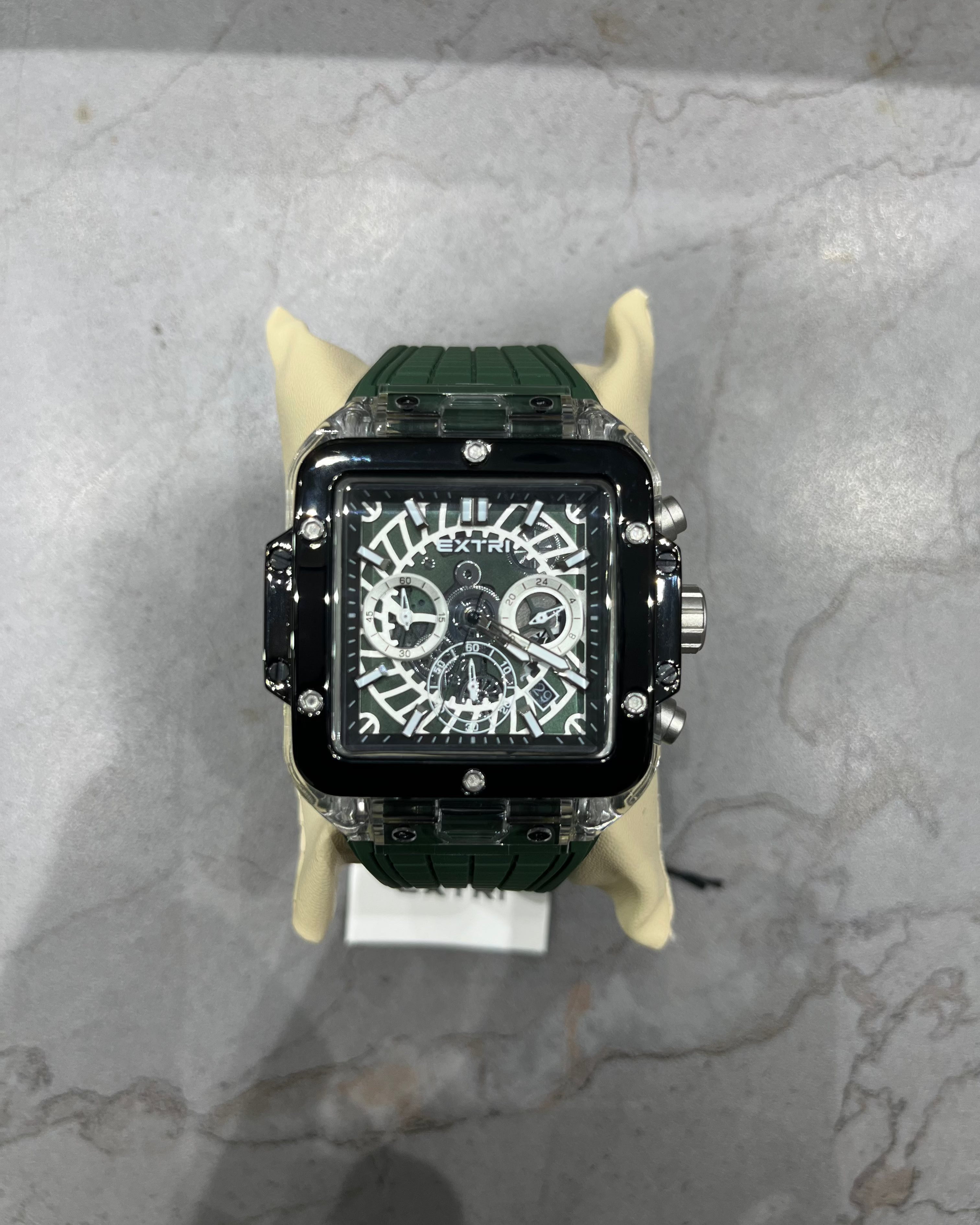 Luxury watch with a unique design on a marble surface