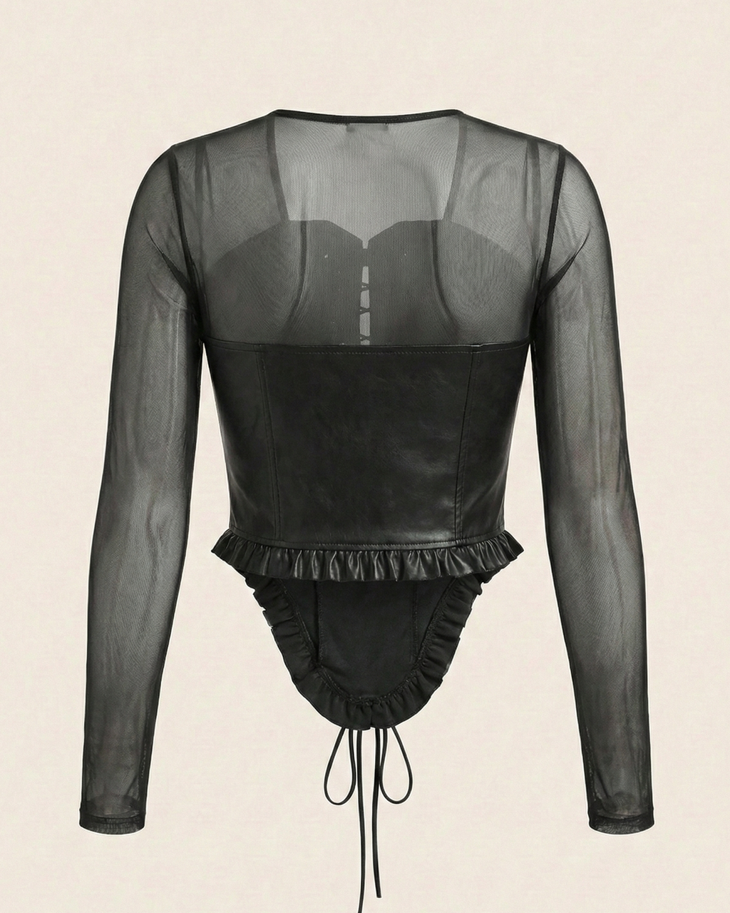 Black sheer long-sleeve top with ruffled details on a beige background