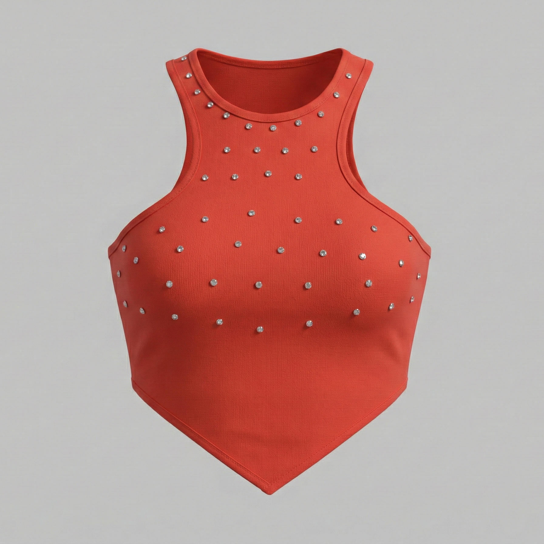 Red crop top with studded details on a gray background