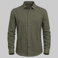 Green button-up shirt on a light gray background