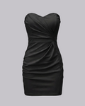Black strapless dress on a gray background