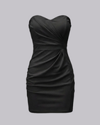 Black strapless dress on a gray background