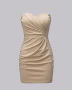 Beige dress on a light gray background