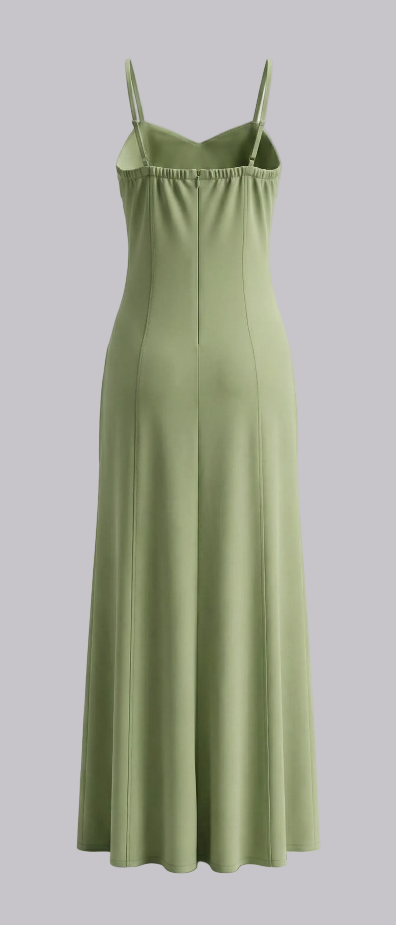 Green slip dress on a white background