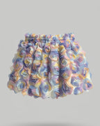 Multicolored textured object on a gray background