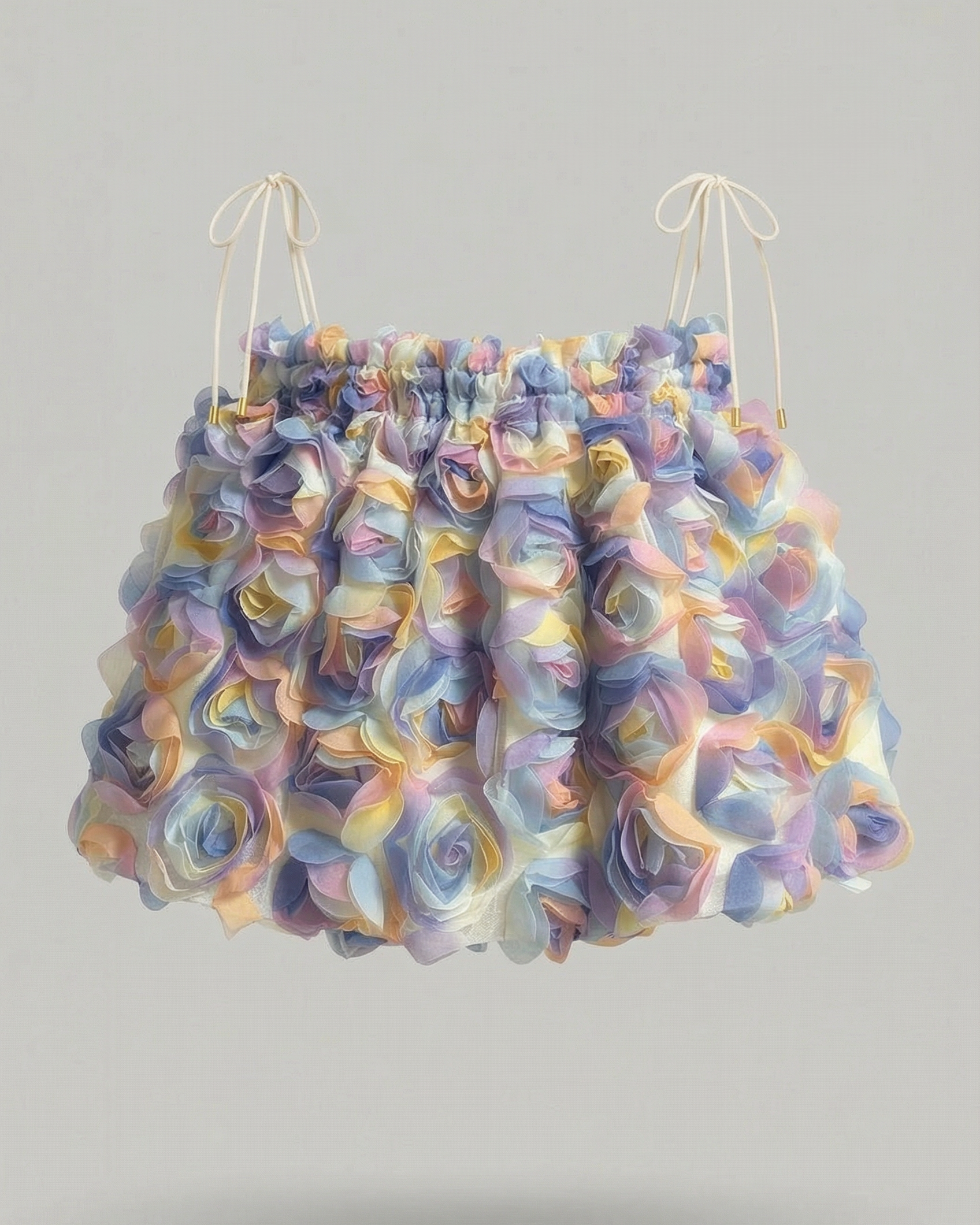 Colorful ruffled skirt on a gray background